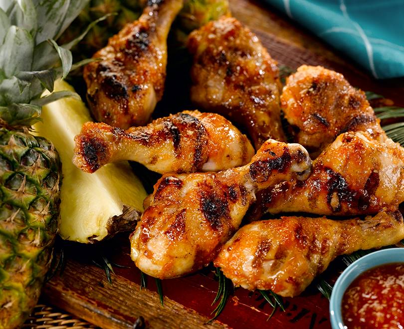 Grilled Chicken Drumsticks with Pineapple Sriracha Glaze Sanderson Farms